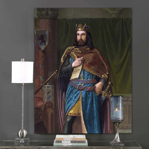 A portrait of a man dressed in regal attire with a crown hangs on the gray wall next to a candle