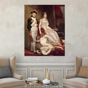 Portrait of a couple dressed in white royal attires hangs on a white wall near two beige armchairs