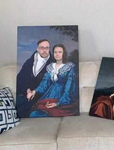 Load image into Gallery viewer, Portrait of a couple dressed in blue royal clothes standing on a white sofa
