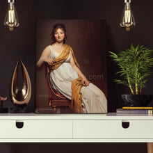 Load image into Gallery viewer, Portrait of a Greek woman dressed in white regal attire stands on a white table near two light bulbs
