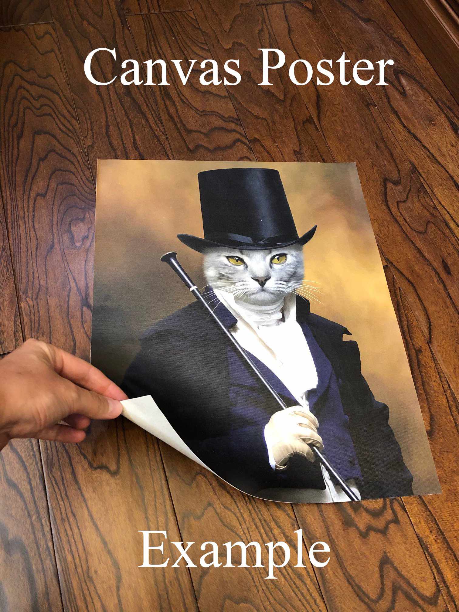 Canvas poster with a portrait of a cat lies on the wooden floor