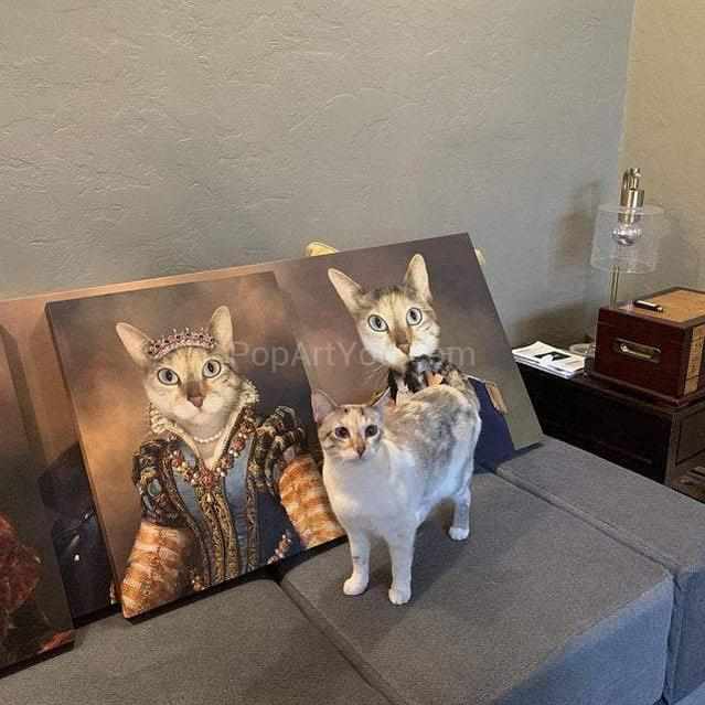 The female cat stands near two portraits of himself with a human body dressed in a golden royal dress