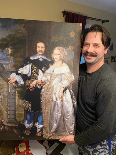 A man with a mustache with a smile on his face is holding a portrait of himself with his married couple dressed in historical royal clothes