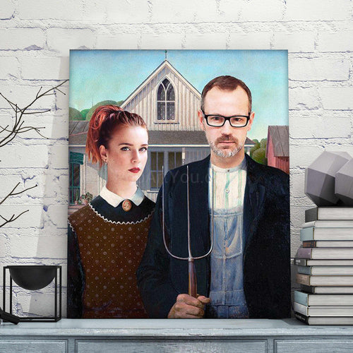 Portrait of a young couple dressed in historical Gothic clothes stands on a blue table near books